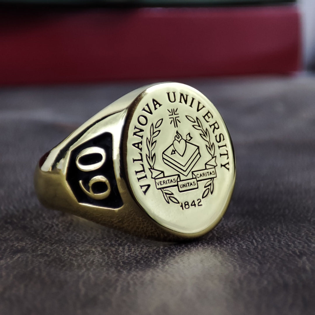 Designed for men and women, this custom university ring celebrates academic achievements with personalized engraving. Add a name, class year, or initials to make it truly unique. A perfect graduation or alumni gift, this elegant college signet ring is a timeless symbol of success, crafted from high-quality materials for long-lasting durability.