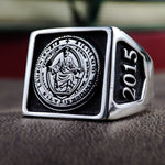 Load image into Gallery viewer, This men's silver university ring is a bold statement piece, featuring a square design with custom engravings. Whether for a graduate, student, or alumni, this ring is a meaningful symbol of dedication and hard work. The polished silver finish enhances its elegance, making it a refined and timeless piece of academic jewelry. Ideal for celebrating milestones, it is a perfect graduation gift.
