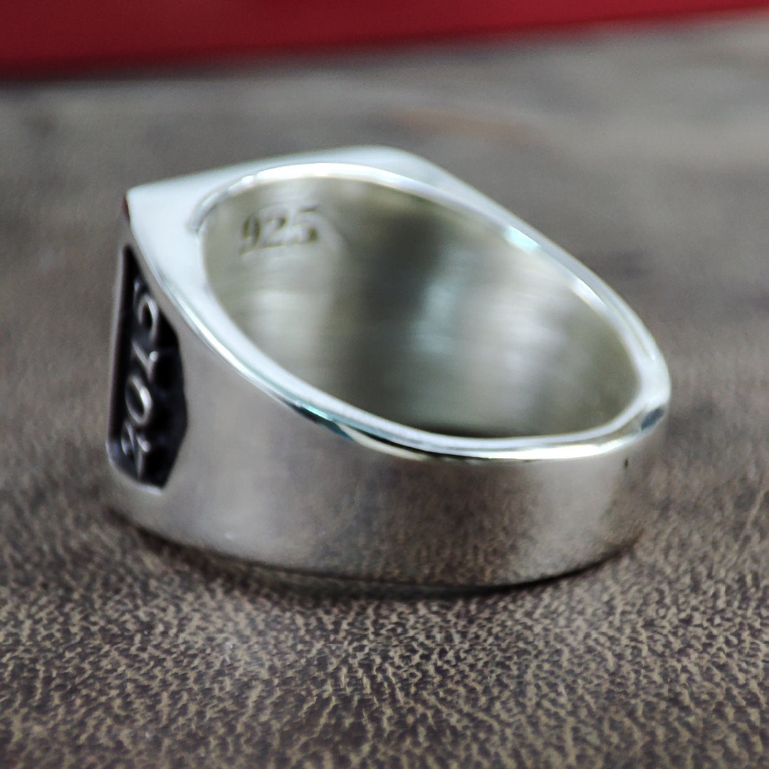 Honor your academic achievements with this square silver college ring, a perfect memento for students and alumni. This signet ring is crafted with intricate details and can be engraved with class year, initials, or a school crest. A sleek, stylish, and durable piece, it’s designed for everyday wear and makes a meaningful gift to celebrate graduation or academic success.