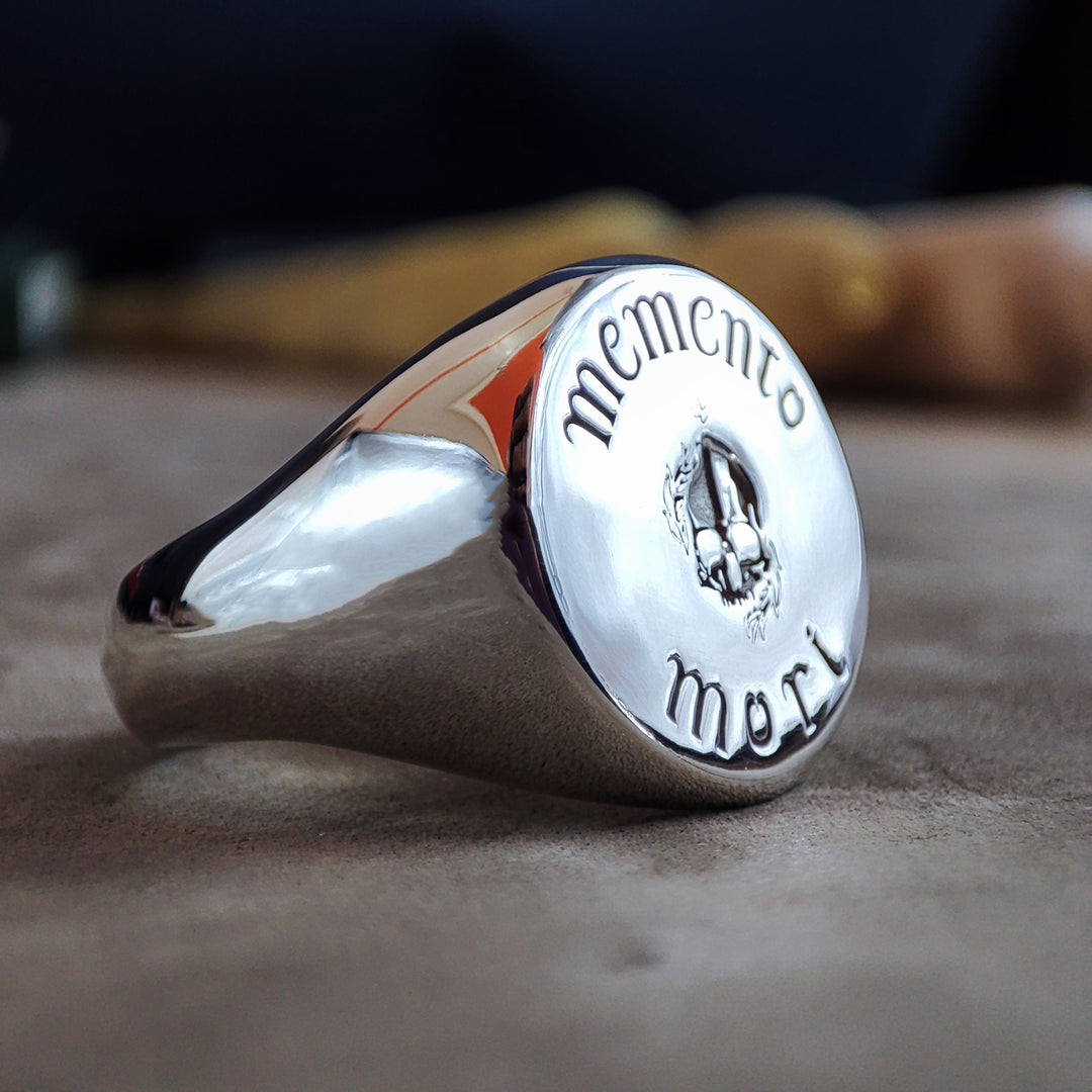 Memento Mori ring in gold, engraved with a symbolic reminder of mortality. This ring is perfect for those who appreciate deep, meaningful jewelry with a philosophical touch.