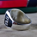 Load image into Gallery viewer, Gold university ring for men featuring a striking stone, perfect for commemorating graduation. This ring is a distinguished keepsake for men who value tradition and accomplishment.