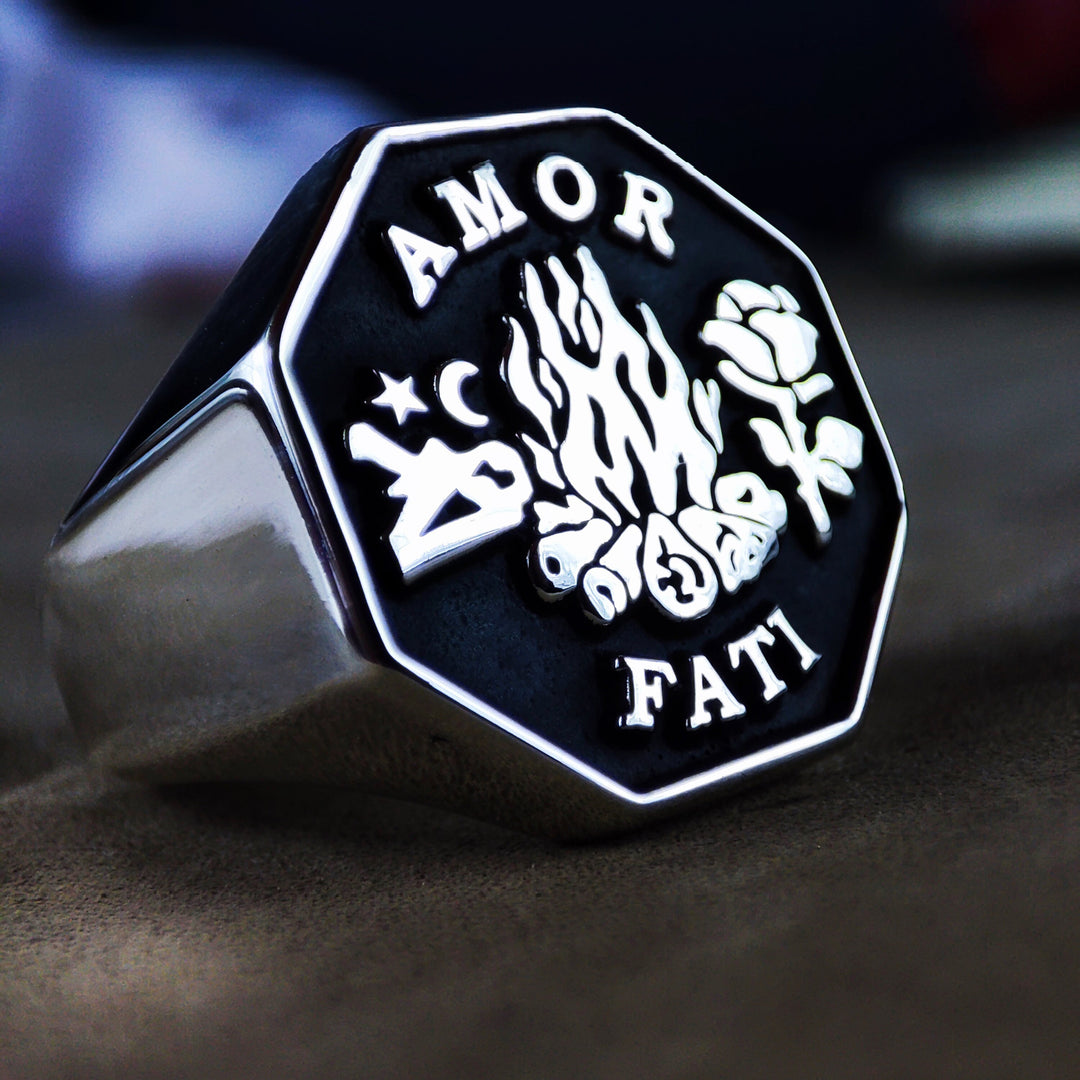 Amor Fati ring, engraved with “Amor Fati” in gold, symbolizing acceptance and love for one’s fate. This inspirational piece is ideal for daily wear or as a unique, motivational gift.