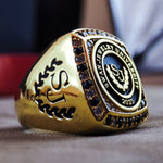 Load image into Gallery viewer, Shiny and elegant university ring with a bright stone, perfect for recent graduates. This gold-filled ring adds a touch of sophistication.