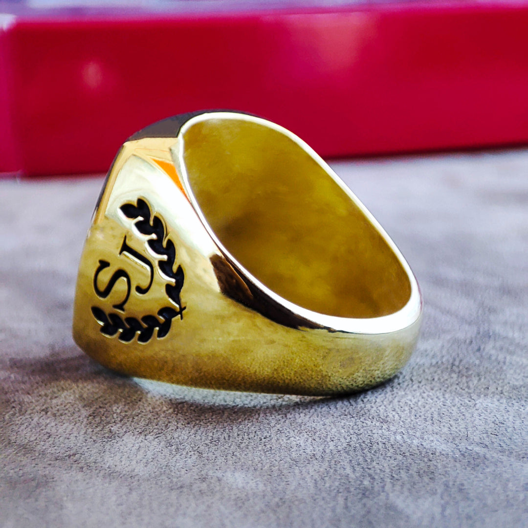 Stunning gold-filled college ring, featuring a central stone for added brilliance. A beautiful way to celebrate graduation or special achievements.