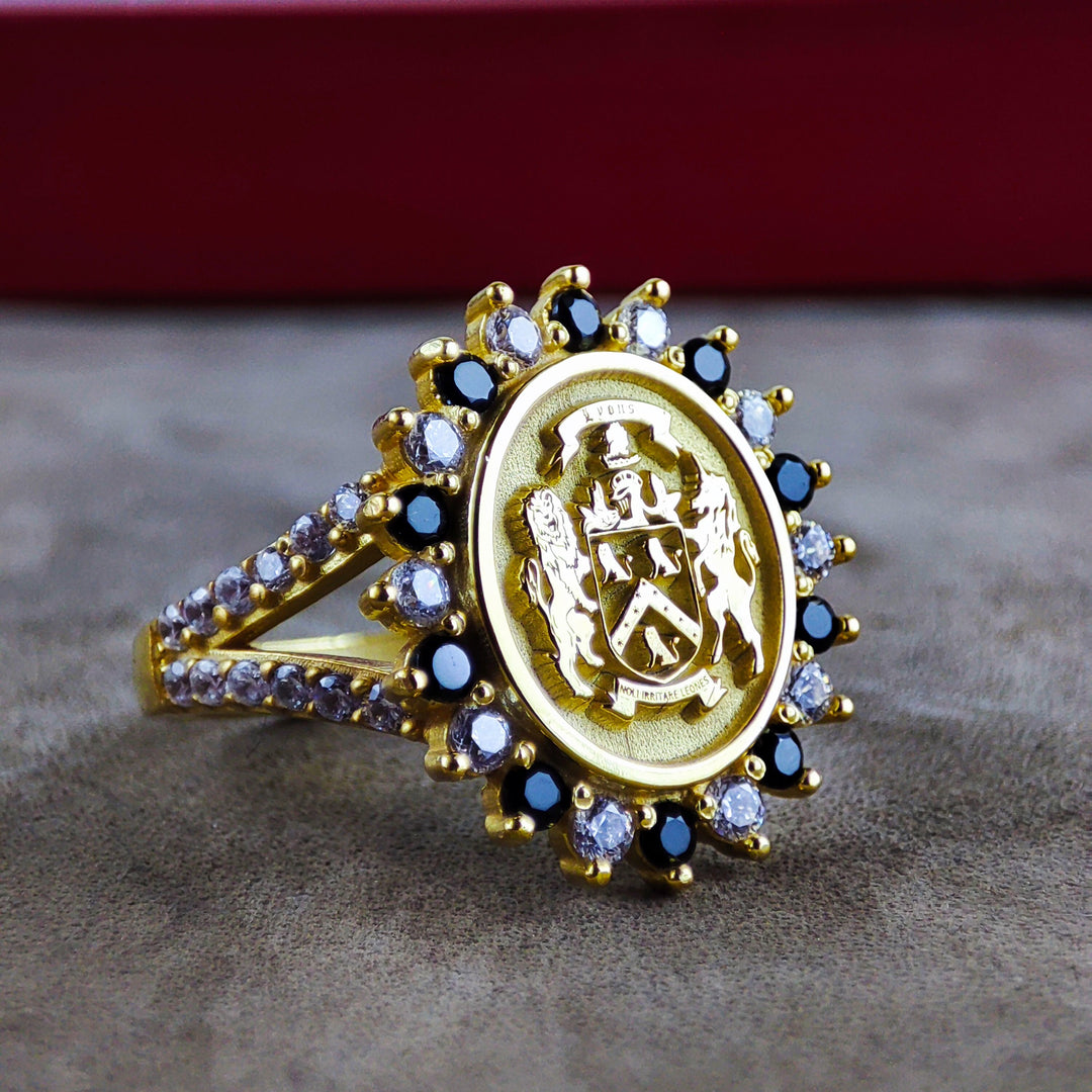 Gold crest ring for women, custom engraved with a family shield. A unique jewelry piece that celebrates heritage, suitable for those who value meaningful family connections.