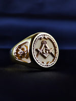 Load image into Gallery viewer, Custom Masonic ring in gold plated finish with personalized engraving options including initials or lodge number. The ornate band design and central emblem reflect tradition and brotherhood. This bold men's ring is ideal for everyday wear or Masonic events. Handcrafted with precision, it’s a perfect way to honor your journey. A meaningful piece that combines symbolism, identity, and refined design in gold.