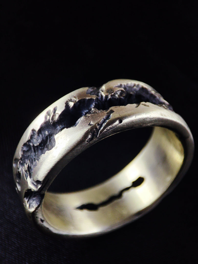 Unique rustic engagement ring, featuring a vintage-inspired design in gold or silver.