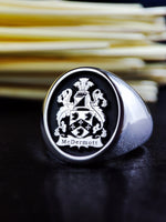 Load image into Gallery viewer, Designed for those who value history and heritage, this heraldic silver ring is a bold and elegant representation of nobility. Featuring an intricately engraved family crest, this signet ring is a meaningful and unique heirloom. Whether worn as a daily statement or reserved for special occasions, this personalized jewelry piece exudes timeless sophistication.