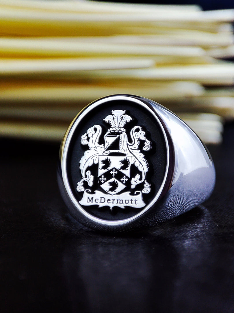 Designed for those who value history and heritage, this heraldic silver ring is a bold and elegant representation of nobility. Featuring an intricately engraved family crest, this signet ring is a meaningful and unique heirloom. Whether worn as a daily statement or reserved for special occasions, this personalized jewelry piece exudes timeless sophistication.
