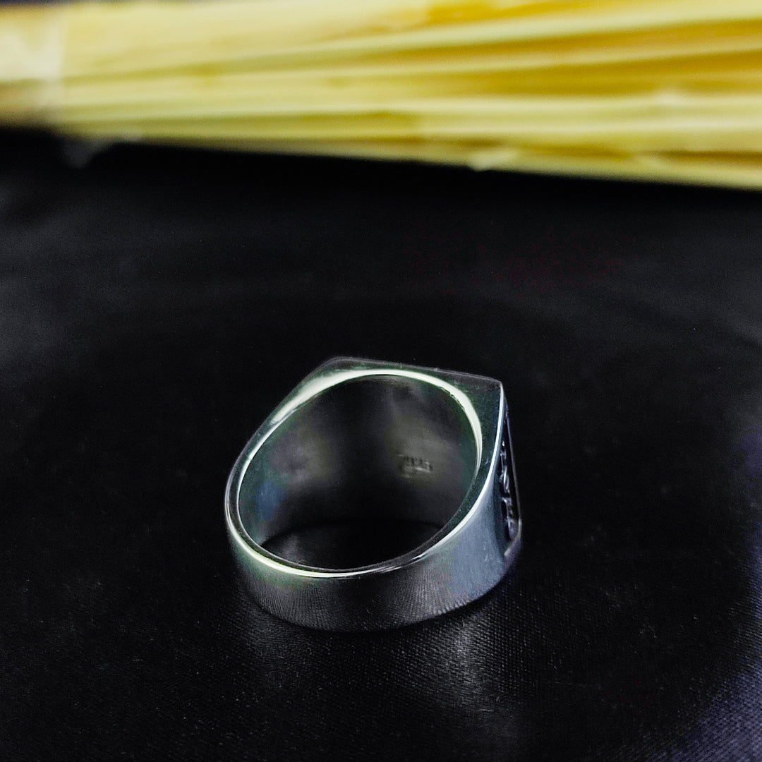 This square silver signet ring is the ultimate custom jewelry piece, featuring a monogram engraving of your choice. Designed to be worn as a personal keepsake or a meaningful gift, this unique initial ring is crafted for men and women who love elegant yet bold accessories. A durable and classic jewelry piece, perfect for celebrating personal milestones or honoring family heritage.