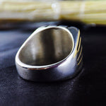 Load image into Gallery viewer, This silver signet ring is a true symbol of heritage and honor, featuring an intricately engraved coat of arms or family logo. Designed for men, this custom square ring is a bold statement piece that blends history with modern craftsmanship. A perfect gift for those who cherish family tradition, offering a sophisticated and unique touch to any collection.