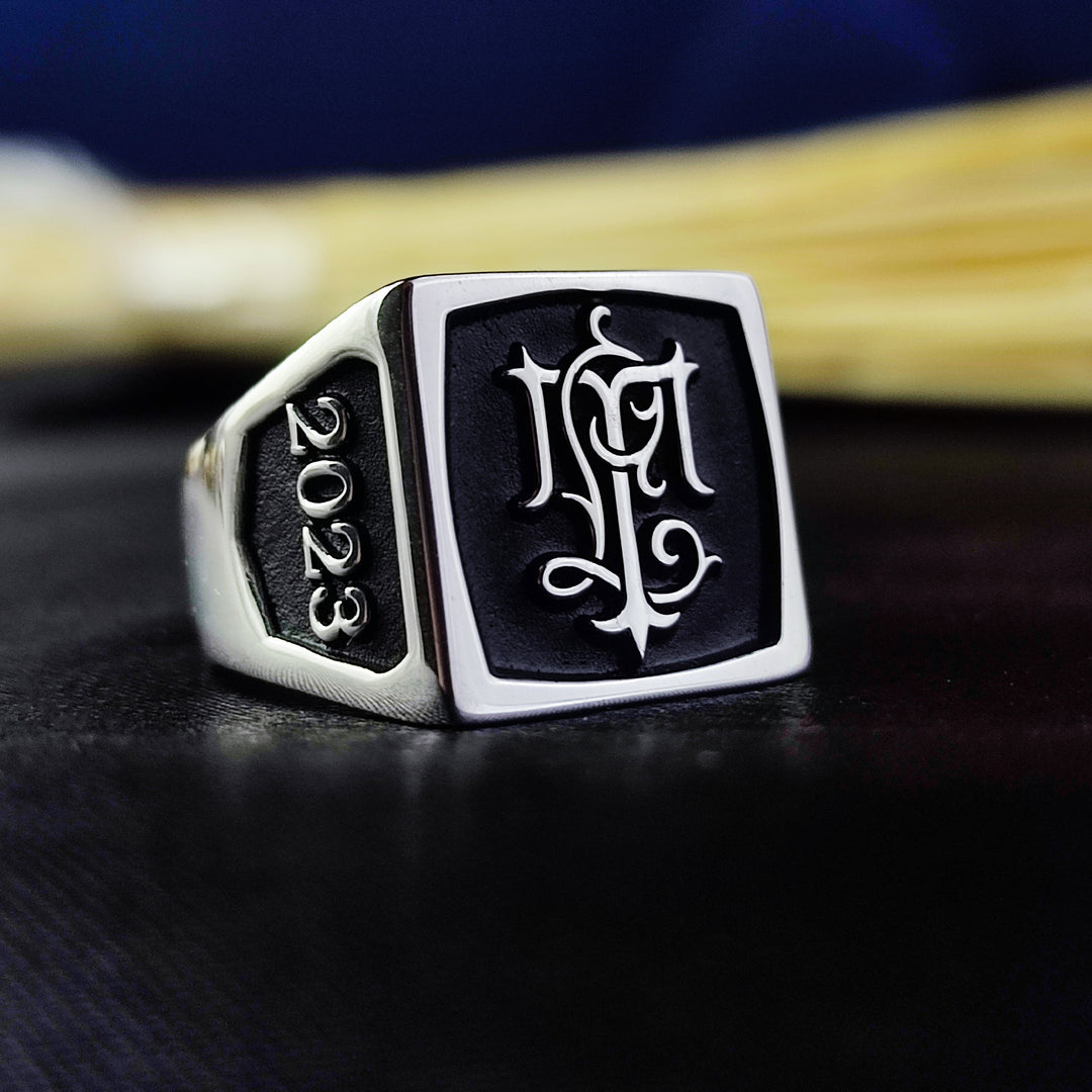 A unique and meaningful accessory, this square silver initial signet ring is the perfect blend of tradition and personalization. Engraved with custom letters of your choice, it serves as a beautiful tribute to family, heritage, or personal identity. Crafted in high-quality silver for a sleek and elegant look, this monogram ring makes an exceptional gift for both men and women on any occasion.