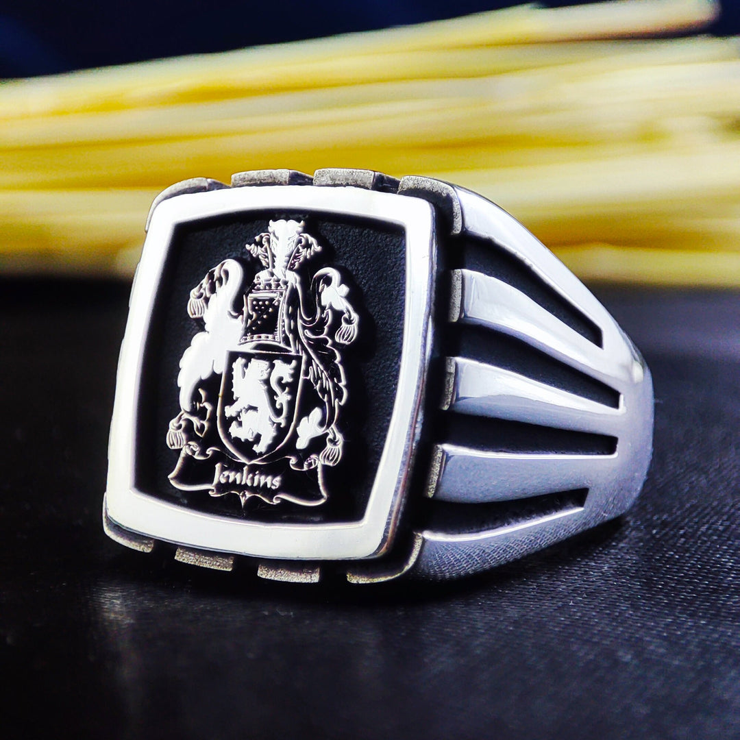 This exquisite family crest ring is a bold and stylish signet piece, crafted in high-quality silver. Featuring a square design with a personalized engraving of a family emblem, initials, or coat of arms, it is a perfect gift for men who value history and tradition. An elegant way to carry personal heritage, this ring is designed for both formal and everyday wear.