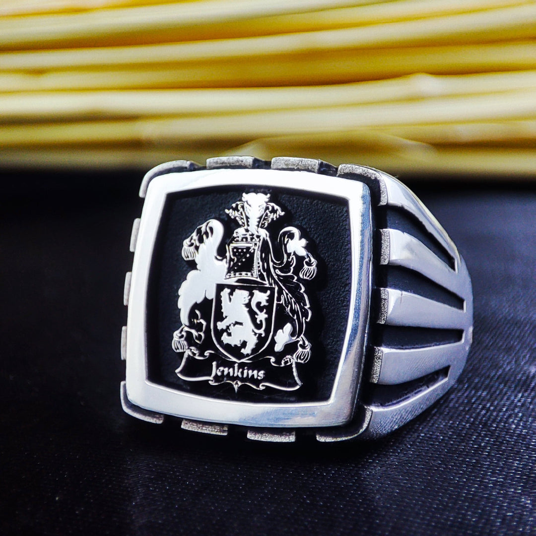 Mark your legacy with this handcrafted family logo ring, engraved with a custom crest or initials. Made in solid silver, this square signet ring is perfect for those who appreciate historical significance and refined craftsmanship. A meaningful gift for men who value heritage, making it an elegant and symbolic jewelry piece for daily wear or special events.