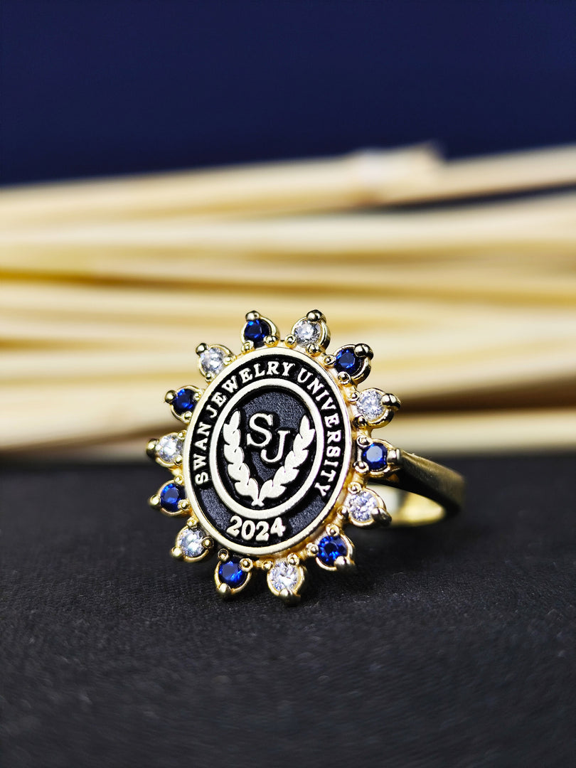 Custom college ring for women, crafted with vibrant stones and a university crest. Ideal for those who appreciate elegant and meaningful jewelry.