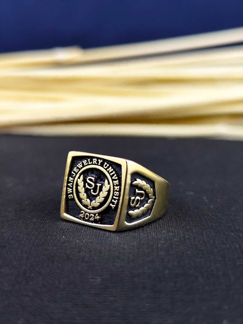 Personalized university ring for men with a square face, ideal for honoring academic accomplishments. Available in gold or silver.
