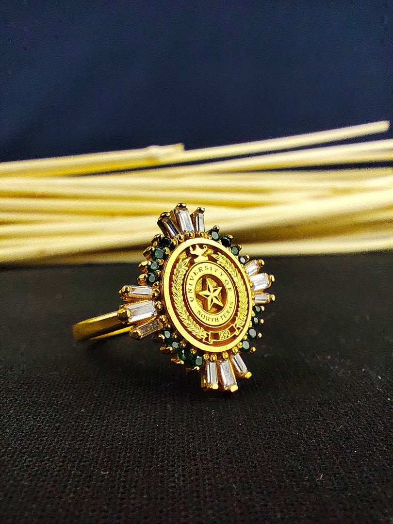 Designed for graduates and alumni, this elegant gold vermeil university ring features a radiant baguette-cut gemstone. A sophisticated and personalized class signet ring for women, this piece embodies success and achievement. Perfect as a graduation keepsake or a special occasion gift, its luxurious design ensures it remains a timeless accessory in any jewelry collection.