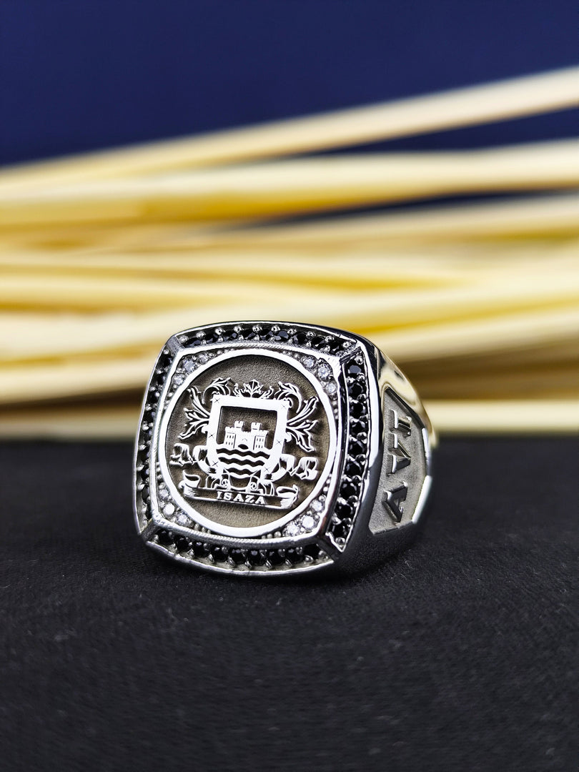 This black stone signet ring is a symbol of nobility and personal heritage. Designed with a custom family crest engraving, this coat of arms ring is a unique and meaningful gift for men. Crafted in silver, its luxurious and durable finish ensures it remains a timeless piece. A perfect choice for those who appreciate heraldic jewelry with a personal touch.