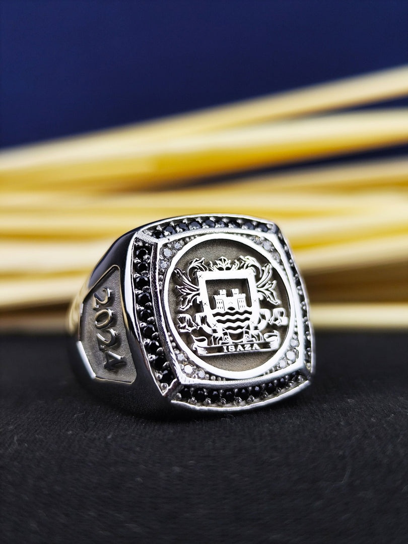 Celebrate your heritage with this custom engraved coat of arms ring. This silver men's signet ring features a detailed family crest design and a deep black stone, offering a unique and meaningful touch. Whether worn as a statement piece or an heirloom, this heraldic jewelry is crafted for elegance and durability. A special keepsake for noble traditions.