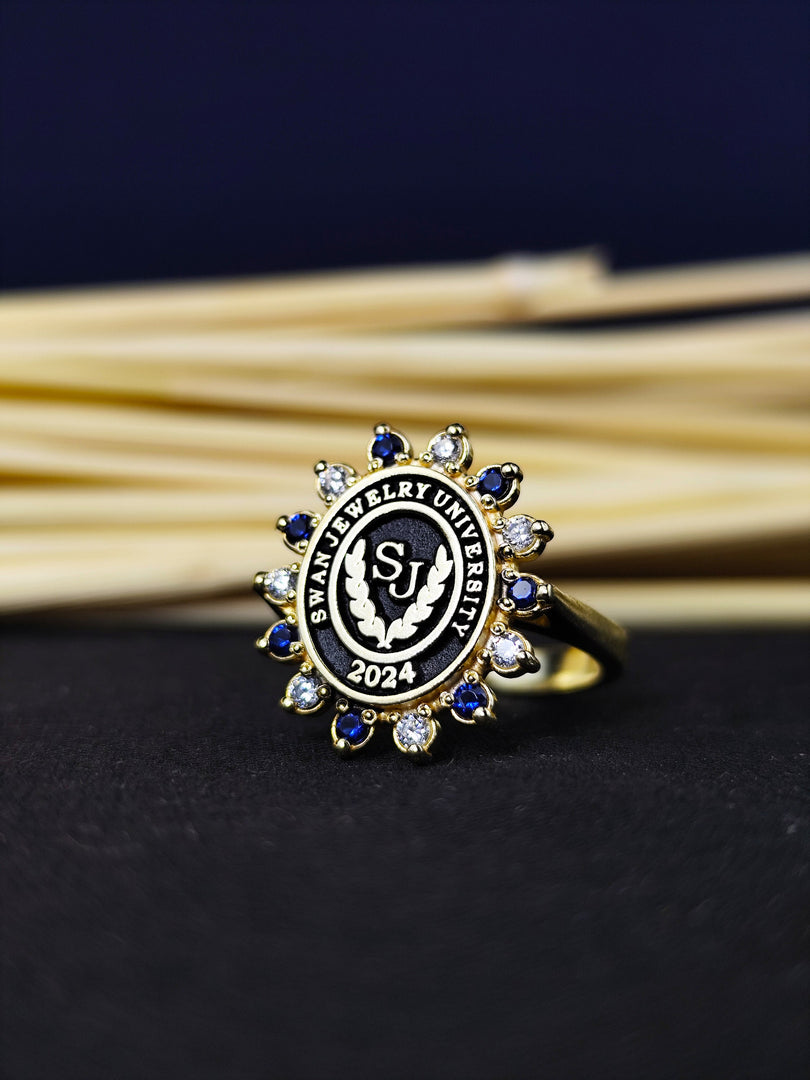 Personalized university ring for women with colorful stones, adding a touch of sophistication. This ring is a stylish way to commemorate graduation.