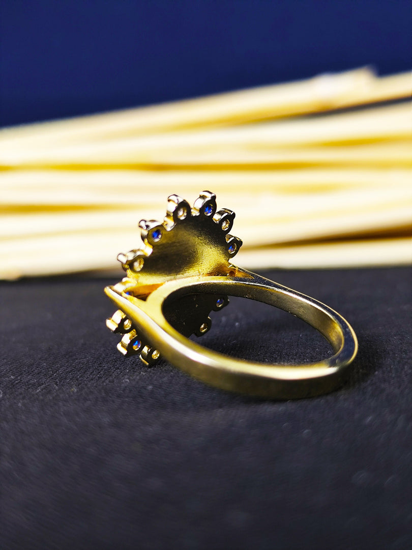 Delicate women’s signet ring with colorful stones, perfect for university graduates. This elegant ring is a beautiful reminder of college memories.