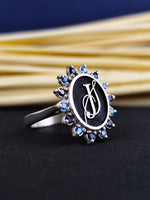 Load image into Gallery viewer, Monogram stone ring for women, featuring a custom letter in high-quality gold. Perfect for those who appreciate personalized jewelry with a touch of sparkle.