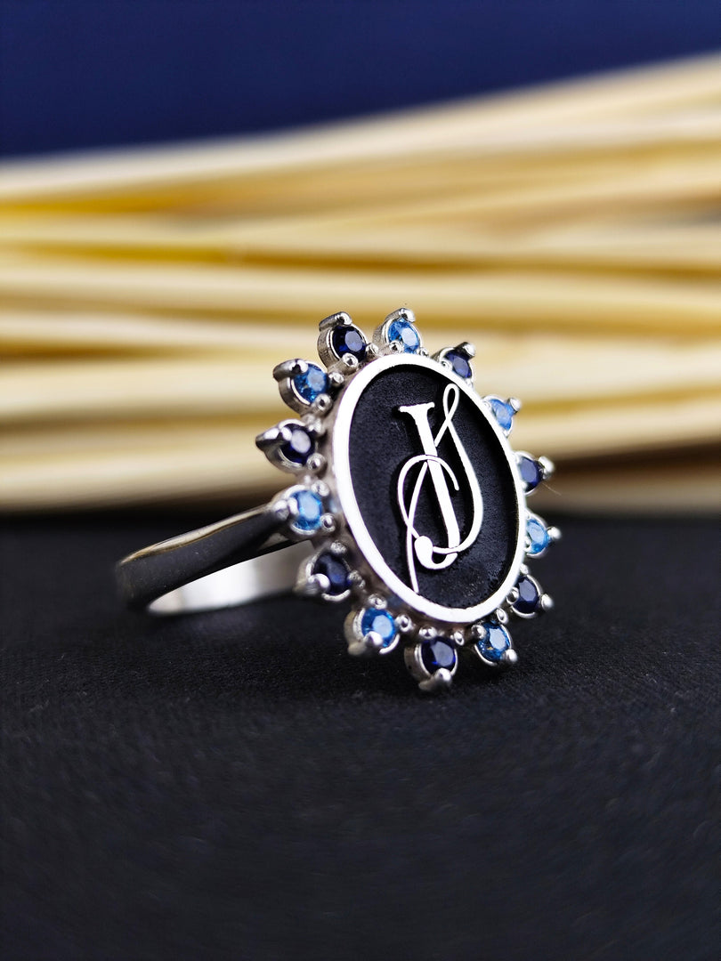 Monogram stone ring for women, featuring a custom letter in high-quality gold. Perfect for those who appreciate personalized jewelry with a touch of sparkle.