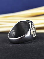 Load image into Gallery viewer, Mark your legacy with this custom coat of arms ring, crafted in sterling silver with a bold black stone centerpiece. A timeless men's signet ring featuring a unique family crest engraving, perfect for those who value heritage and tradition. Whether as a meaningful gift or a personal emblem, this heraldic jewelry is a striking and noble addition.