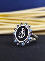 Load image into Gallery viewer, Silver ring for women with a stone and engraved initial. This unique ring is a beautiful way to showcase a special letter or monogram.
