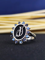 Load image into Gallery viewer, Monogram signet ring with a stone, designed for women. This custom piece in silver is perfect for showcasing a meaningful initial or name.