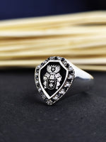 Load image into Gallery viewer, Gold heraldic ring engraved with a personalized family crest, symbolizing heritage and unity. This ring serves as a cherished piece, suitable for special occasions or as a daily reminder of family values.