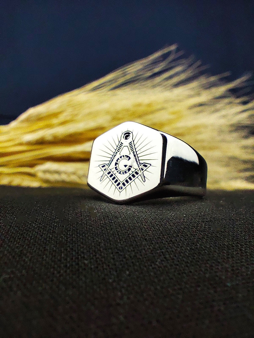 Custom engraved Masonic signet ring with a lustrous polished surface