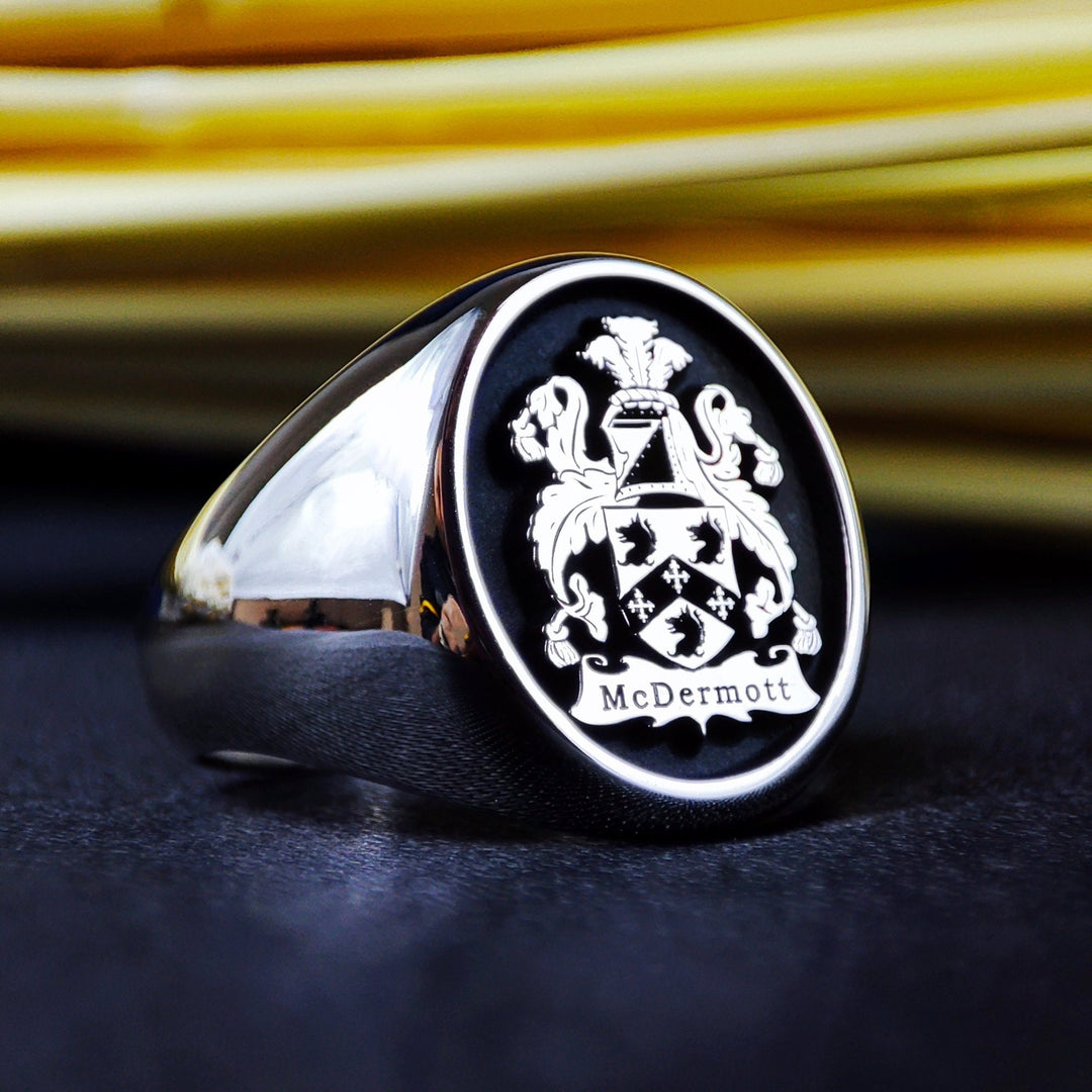 This heraldic silver family crest ring is a stunning custom signet, featuring an engraved coat of arms. Designed for those who value heritage, nobility, and tradition, this heirloom jewelry piece symbolizes family pride. Crafted in sterling silver, this elegant ring makes a timeless statement and a meaningful gift for history lovers, collectors, and those honoring their lineage.