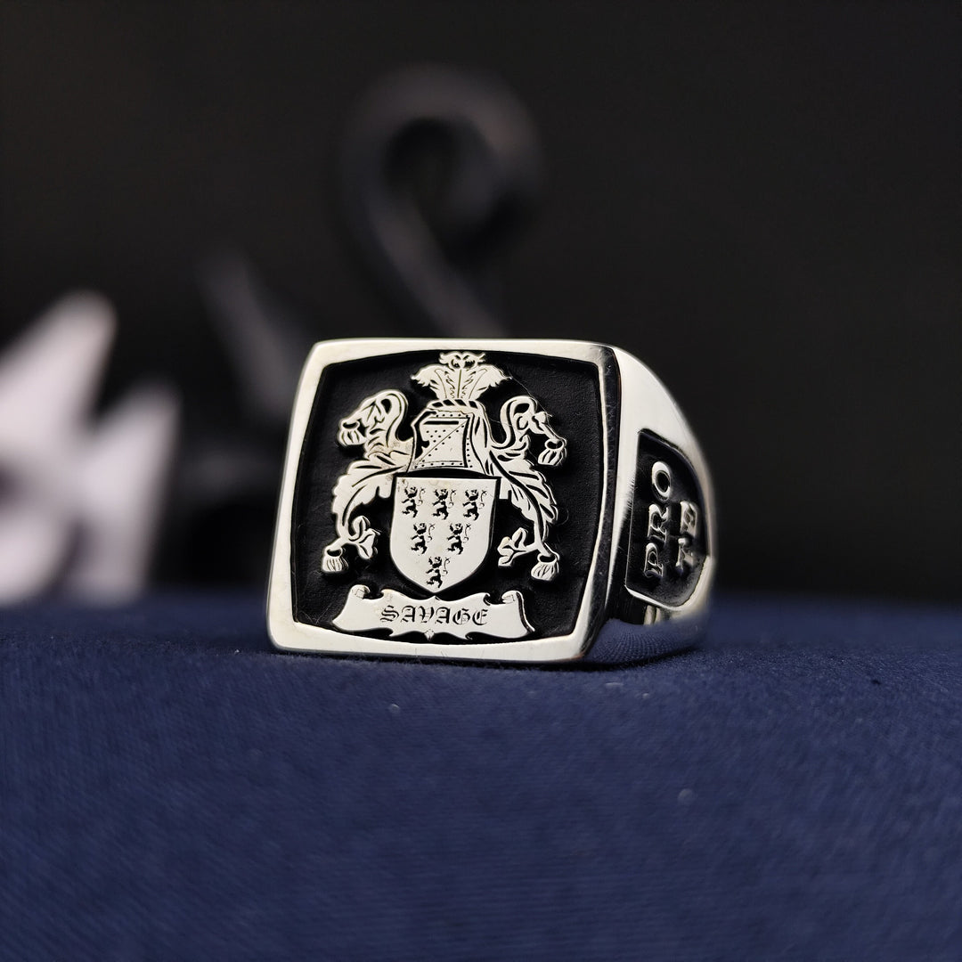This square heraldic family crest ring is crafted in high-quality silver and enhanced with black enamel detailing. Featuring a custom engraved coat of arms, this signet ring is a bold symbol of heritage and nobility. Designed for those who appreciate history and elegance, it is a perfect heirloom piece, ideal as a meaningful gift for special occasions or personal legacy preservation.