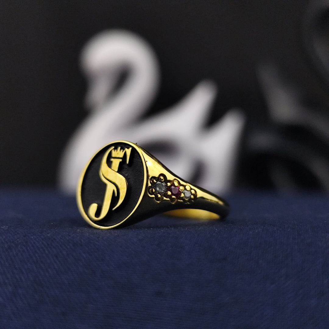 A beautifully crafted custom name ring, featuring a delicate gemstone set in a gold-plated band. This minimalist and elegant jewelry piece is perfect for women who appreciate refined and dainty accessories. Whether given as a thoughtful gift or worn as a cherished personal piece, this engraved name ring adds timeless elegance to any outfit.