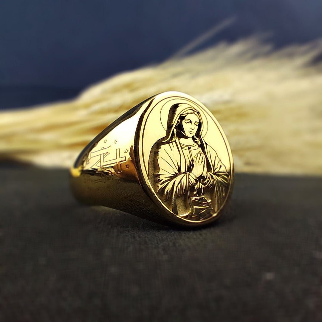 Gold Virgin Mary ring with intricate craftsmanship, a timeless symbol of Catholic devotion.