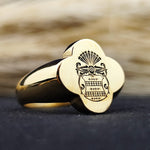 Load image into Gallery viewer, A one-of-a-kind heirloom ring, this gold-plated signet piece showcases a recessed engraving of a noble family crest. The unique shape and deep engraving make it a standout piece of heritage jewelry. Designed for men who value tradition and sophistication, this ring is an elegant addition to any collection, perfect for commemorating lineage and personal history.