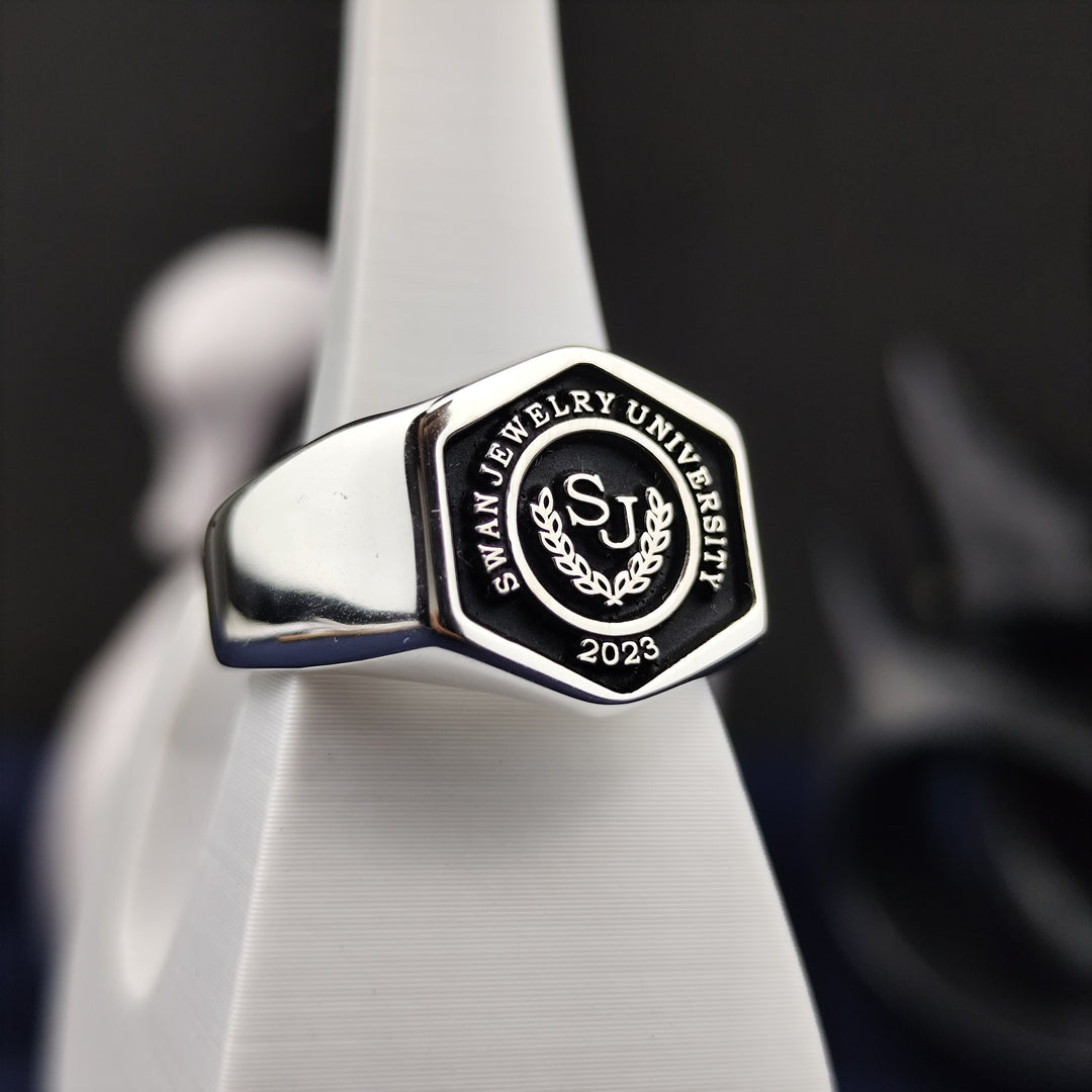 Custom men’s college ring with a hexagonal design, crafted in high-quality silver. Perfect for graduates or proud alumni.
