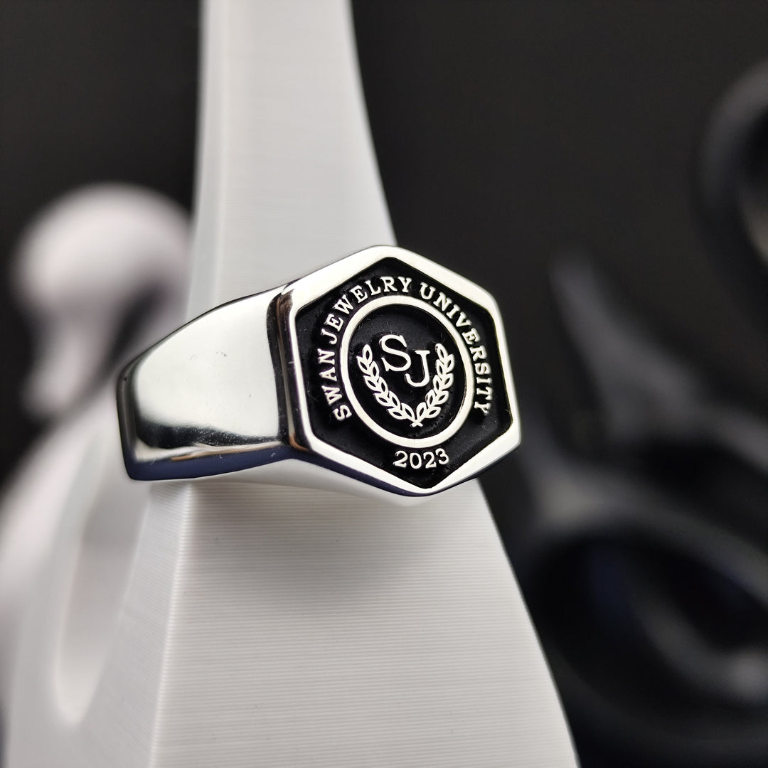 Silver university ring with a hexagonal style, blending modern craftsmanship with a timeless design. Ideal for proud graduates.