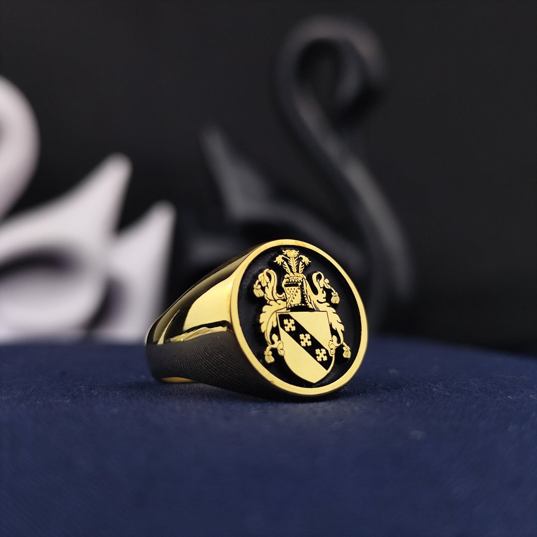 This personalized gold-plated heraldic signet ring is a refined and regal piece of jewelry, featuring a deep-engraved family crest. Its round shape adds a timeless touch, making it ideal for those who value tradition. Whether gifted for a milestone, anniversary, or personal keepsake, this noble crest ring embodies elegance, durability, and family pride, creating a lasting heirloom for generations.