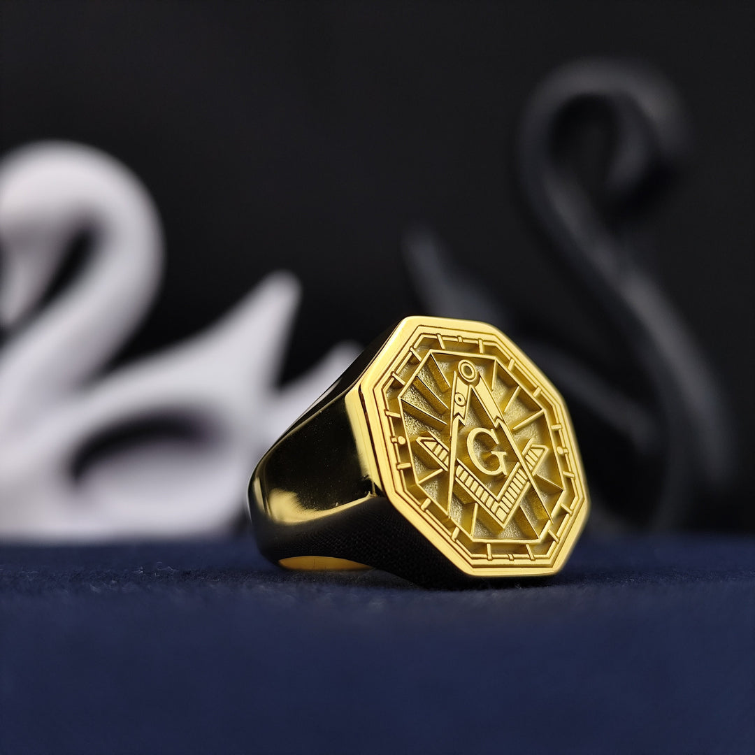 Celebrate Masonic traditions with this custom gold-plated octagon ring, featuring a meticulously engraved square and compass emblem. Designed as a tribute to the Freemason brotherhood, this signet ring is both stylish and meaningful. Ideal for lodge members, collectors, or those who appreciate Masonic heritage, this unique piece adds prestige and distinction to any jewelry collection.