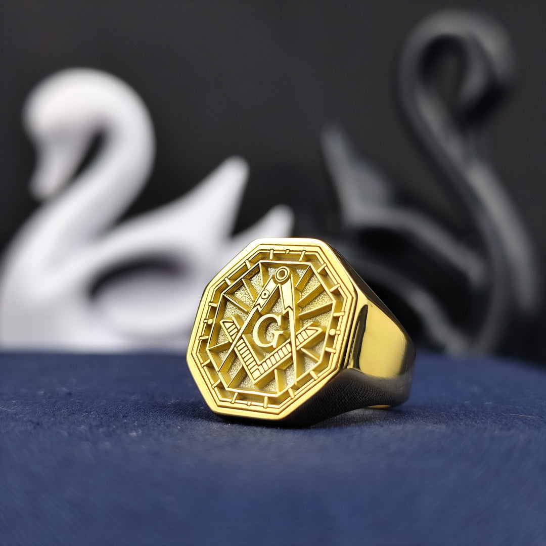 This refined and unique gold-plated Masonic signet ring showcases an octagonal design with deep engraving of the iconic square and compass. A powerful representation of knowledge and fraternity, this ring is a timeless accessory for Masons who take pride in their traditions. Whether as a personal keepsake or a meaningful gift, this lodge ring is crafted to last.