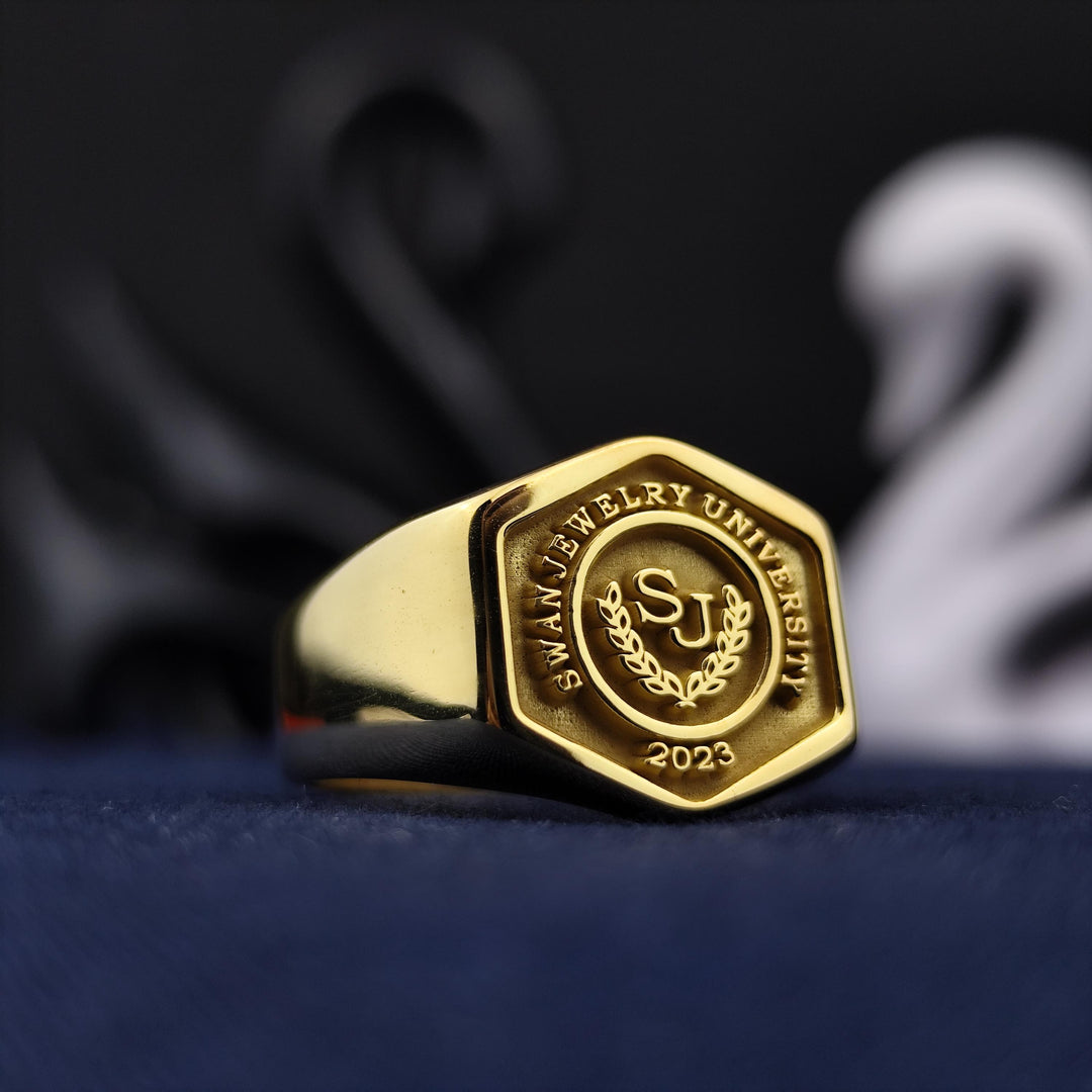 Custom college signet ring in a hexagonal design, gold-plated for a luxurious look. Perfect for alumni or recent graduates.