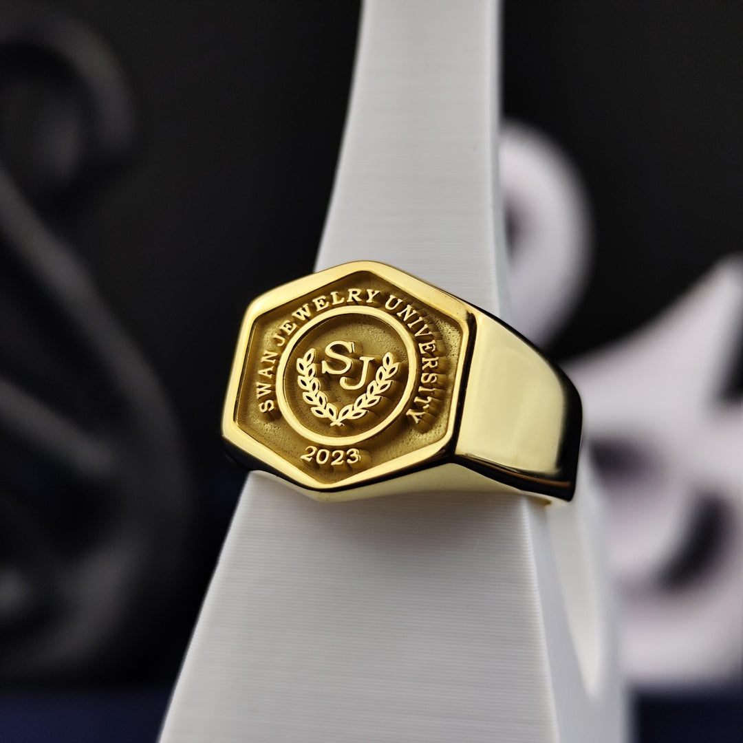 Hexagonal gold-plated university ring, crafted for men to celebrate academic success. A unique and stylish graduation keepsake.