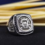 Load image into Gallery viewer, A unique men's signet ring featuring a personalized family crest engraving on sterling silver. This coat of arms ring is complemented by a deep black stone, symbolizing strength and heritage. A perfect statement piece for those who value tradition, history, and elegance. Whether for a special occasion or as a meaningful heirloom, this heraldic jewelry is timeless.