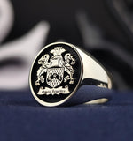 Load image into Gallery viewer, Silver signet ring for men featuring a custom engraved family crest. Perfect for those valuing heritage, this ring combines classic style with personal significance.