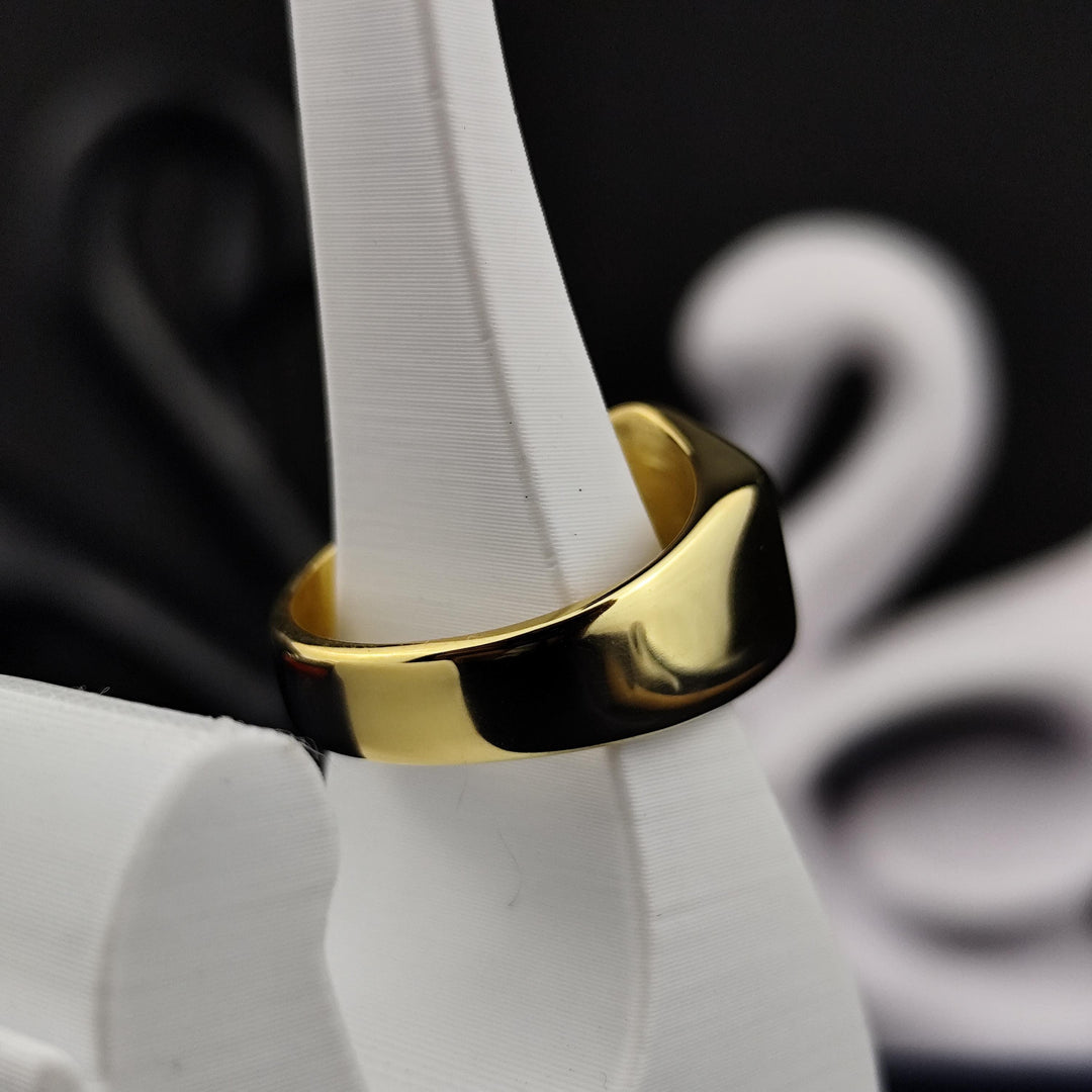 Hexagonal signet ring in gold plating, crafted for men as a custom college graduation accessory. Perfect for celebrating success.