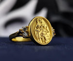 Load image into Gallery viewer, This gold-plated Virgin Mary ring is a beautiful symbol of faith and devotion, designed for women who seek elegance in religious jewelry. Featuring a delicate gemstone accent, this Catholic signet ring is both meaningful and stylish. A perfect gift for birthdays, confirmations, or special occasions, this ring is a reminder of spiritual guidance and protection, making it a cherished addition to any jewelry collection.