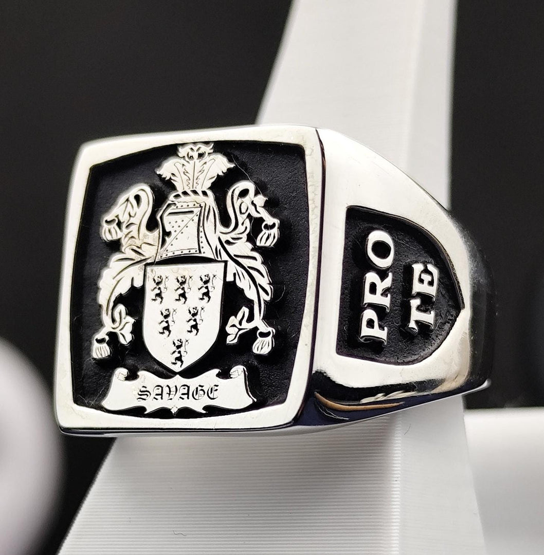A striking square heraldic signet ring, crafted in silver with a deep black enamel finish. The detailed coat of arms engraving highlights the legacy of noble families, making it a refined heirloom piece. Designed for those who appreciate personalized heritage jewelry, this ring is a timeless representation of strength and tradition, perfect for daily wear or special occasions.