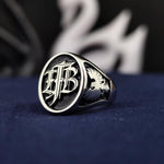 Load image into Gallery viewer, Personalized men’s monogram ring in gold, crafted with custom initials engraving. This classic ring adds a stylish touch to any look, perfect for both daily wear and special occasions.